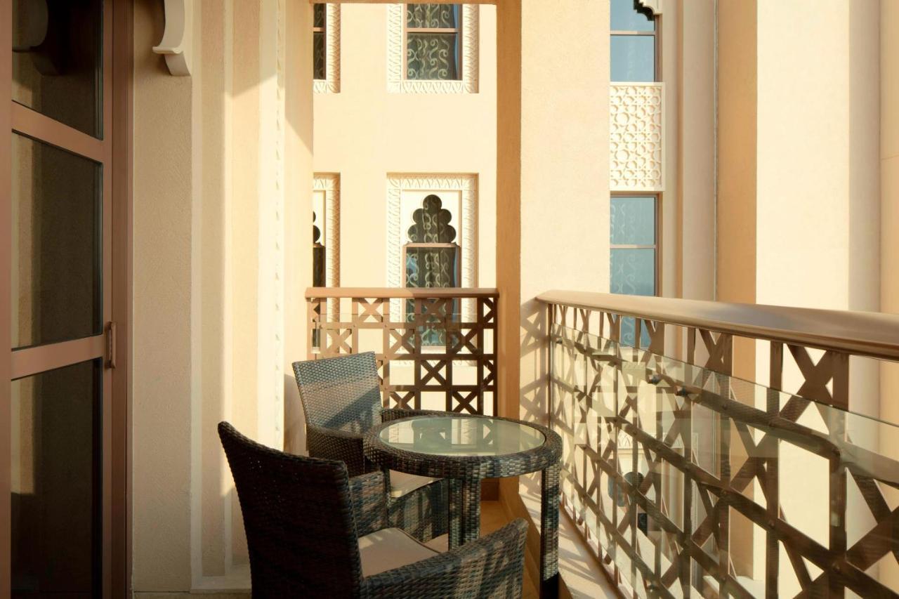 Sheraton Sharjah Beach Resort And Spa Exterior photo A balcony at the hotel