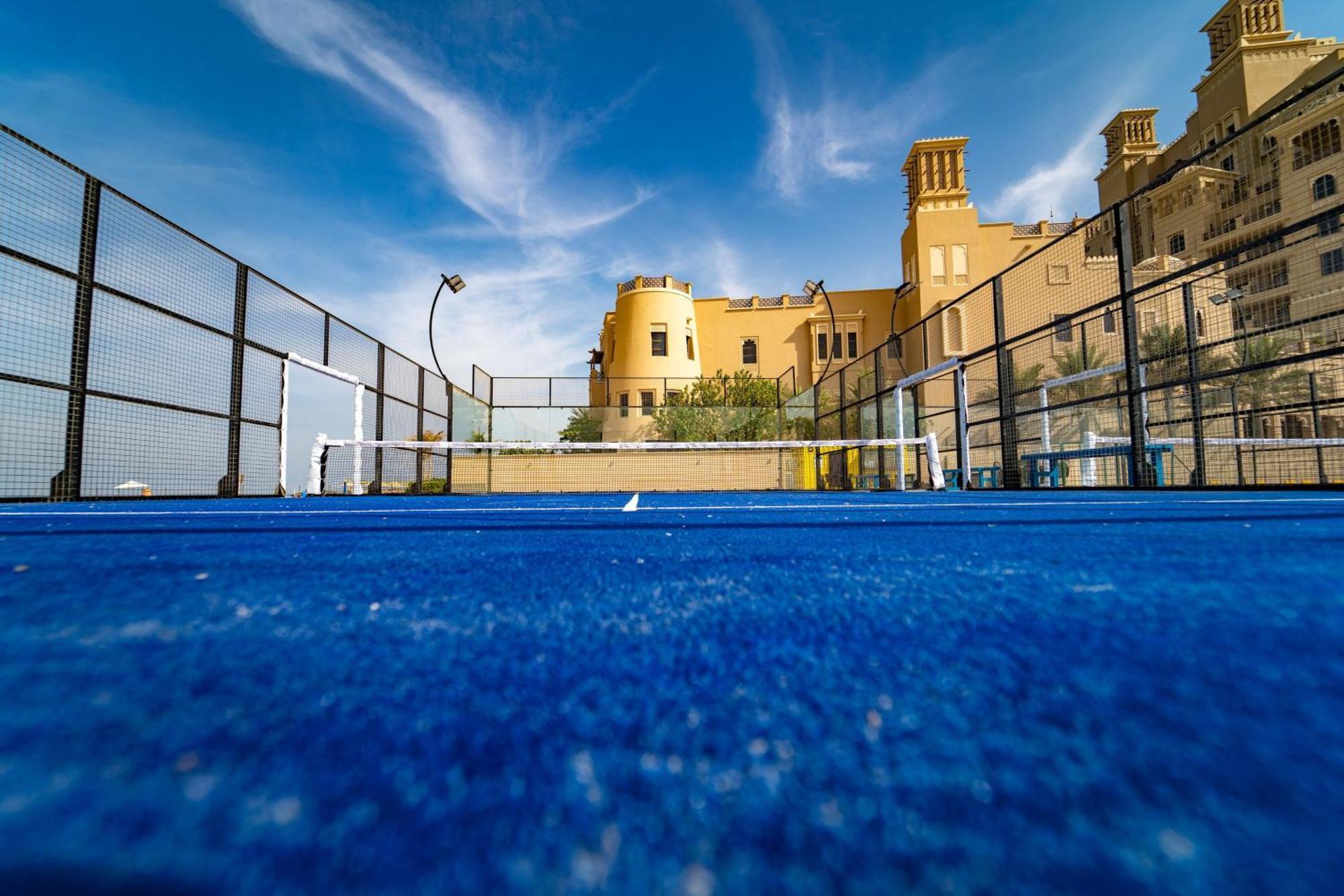 Sheraton Sharjah Beach Resort And Spa Exterior photo Tennis court at the Royal Club