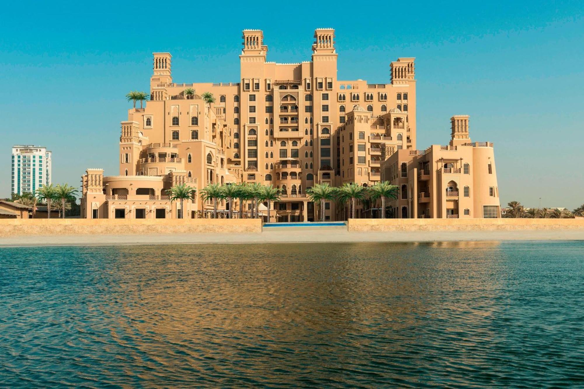 Sheraton Sharjah Beach Resort And Spa Exterior photo The Palace Downtown Dubai